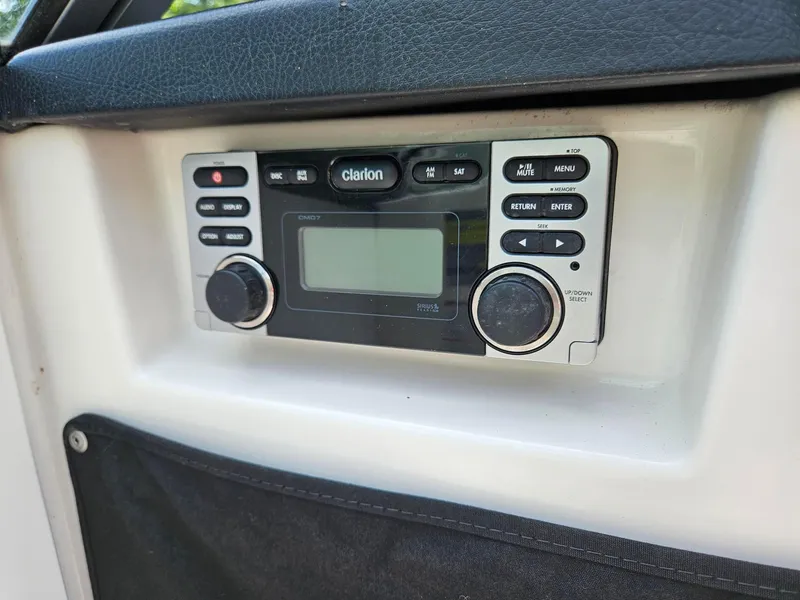 Slide: The Image of Clarion CMD7 stereo system in 2014 Chaparral 224 Sunesta boat dashboard. - 22