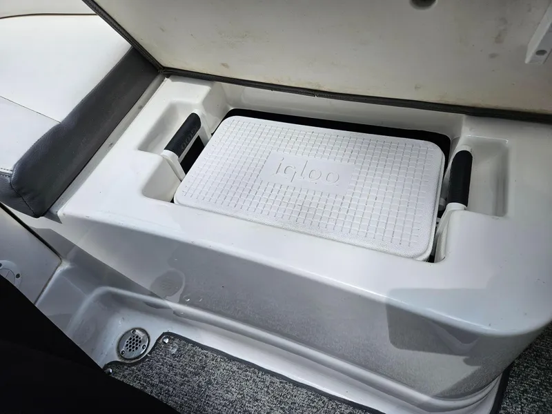 Slide: The Image of Built-in cooler compartment on 2014 Chaparral 224 Sunesta boat. - 31