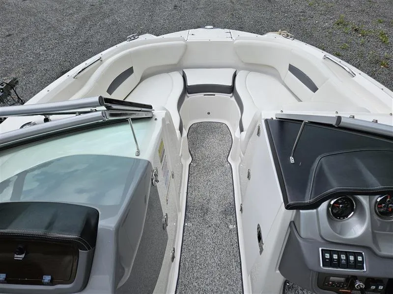 Slide: The Image of 2014 Chaparral 224 Sunesta boat interior with seating and dashboard view. - 7
