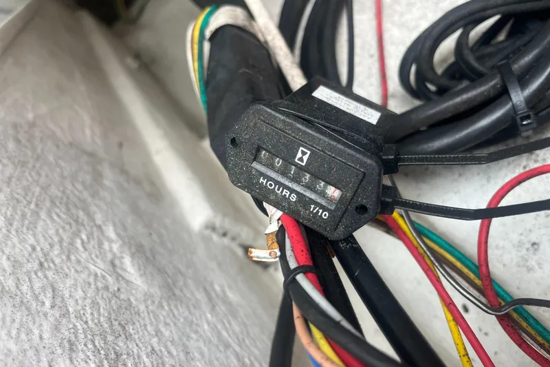 Slide: The Image of Hour meter with wiring on a 1976 Uniflite 28 Salty Dog boat. - 14