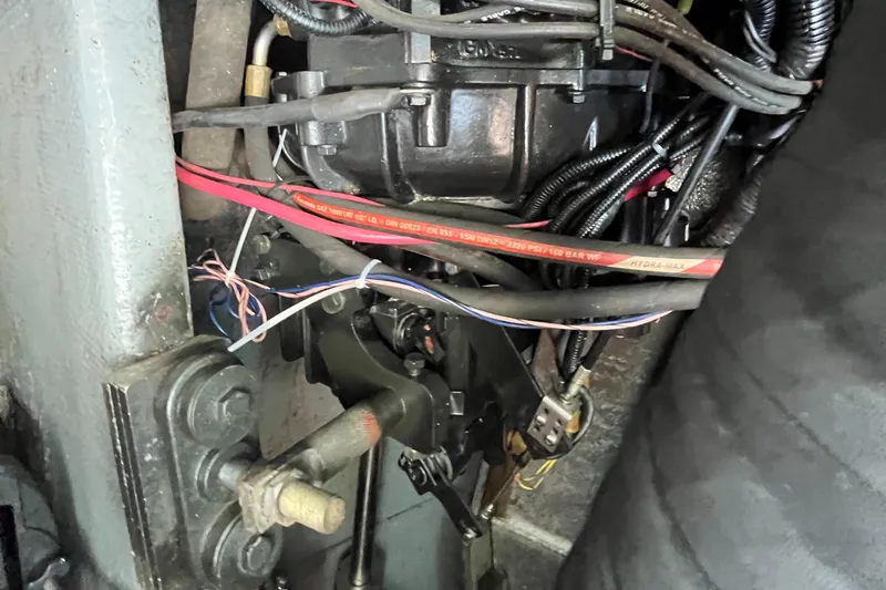 Slide: The Image of Engine wiring and components of a 1976 Uniflite 28 Salty Dog boat. - 41