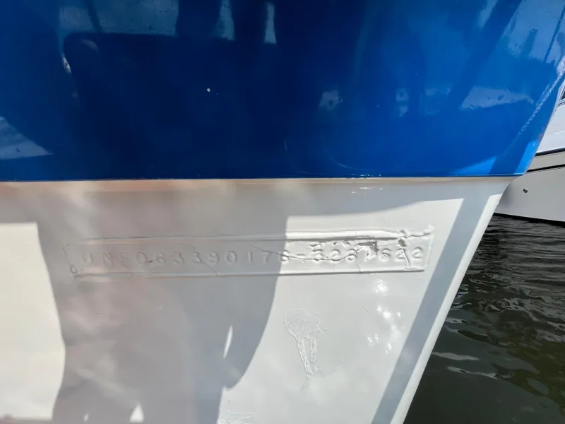 Slide: The Image of 1976 Uniflite 28 Salty Dog boat hull with identification number embossed. - 48
