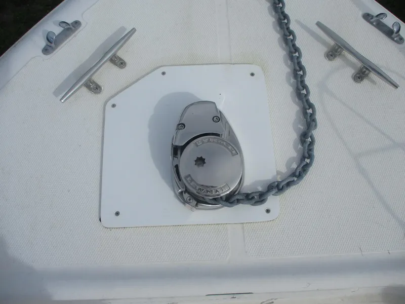 Slide: The Image of Anchor windlass on a 2000 Century 2300 Center Console boat deck. - 7