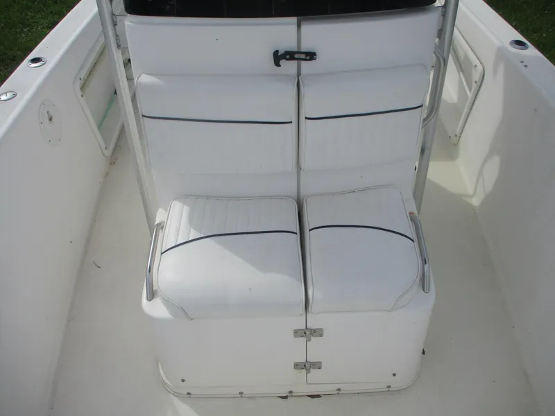 Slide: The Image of Century 2300 Center Console 2000 boat seating, white cushions, clean and spacious design. - 9