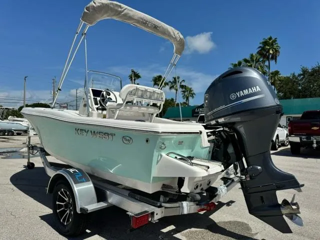 Slide: The Image of 2026 Key West 179 FS boat with Yamaha outboard motor on a trailer. - 3