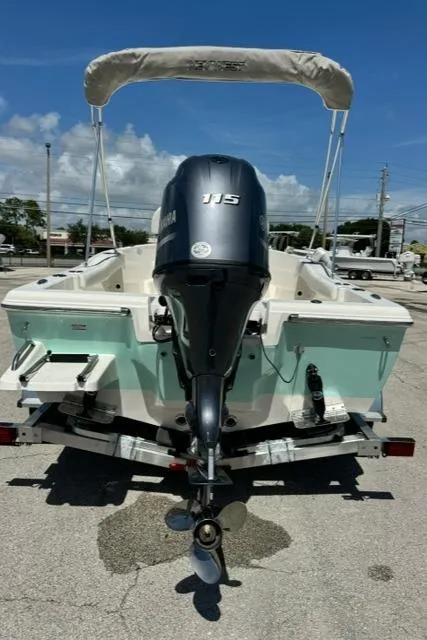 Slide: The Image of 2026 Key West 179 FS boat with Yamaha 115 engine, parked on trailer. - 7