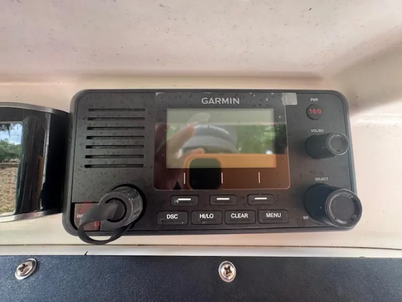 Slide: The Image of Garmin marine radio on 2018 Everglades 243CC boat dashboard. - 8