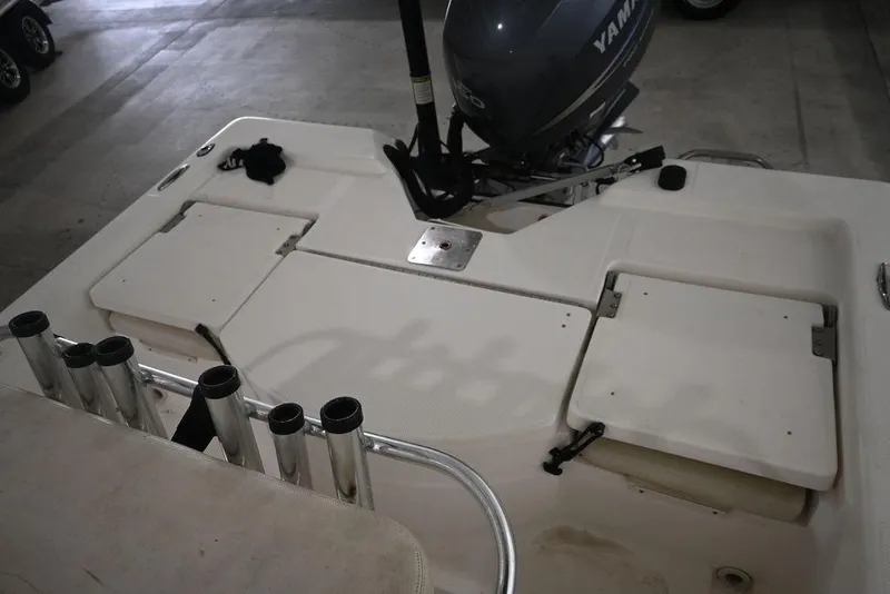 Slide: The Image of 2012 Skeeter ZX20 BAY boat with Yamaha motor, featuring rod holders and storage compartments. - 10