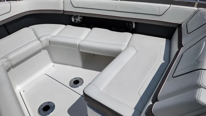 Slide: The Image of 2020 Formula 350 CBR boat interior with white cushioned seating. - 12
