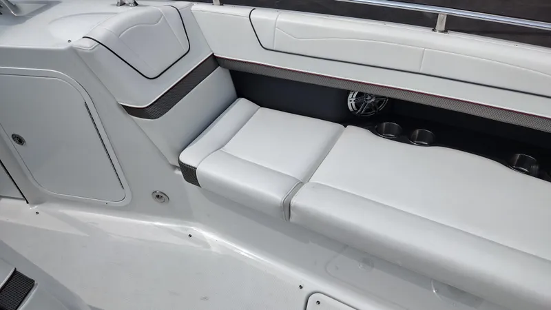 Slide: The Image of 2020 Formula 350 CBR boat interior with white seating and cup holders. - 13
