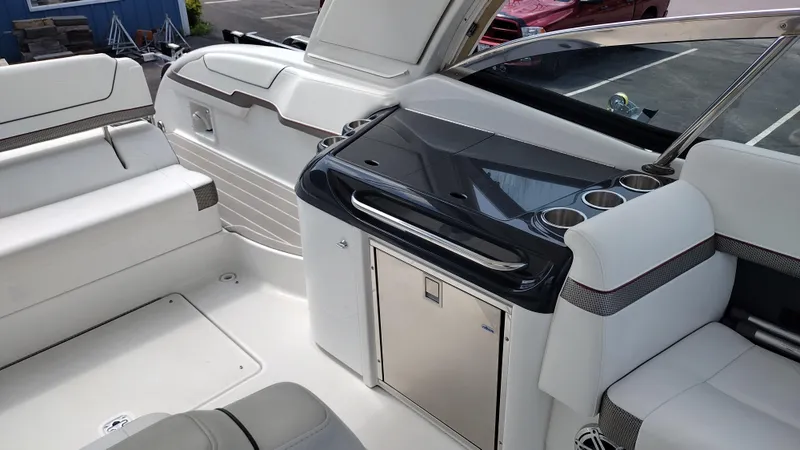Slide: The Image of 2020 Formula 350 CBR boat interior with seating and kitchenette area. - 20