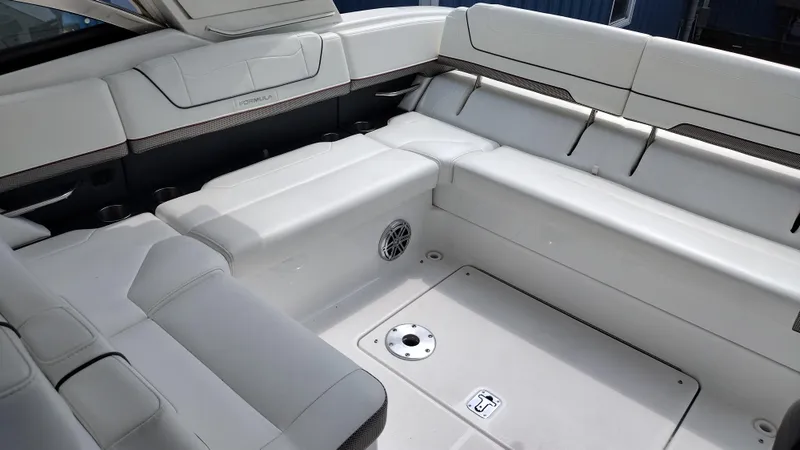 Slide: The Image of 2020 Formula 350 CBR boat interior with spacious white seating and modern design. - 21