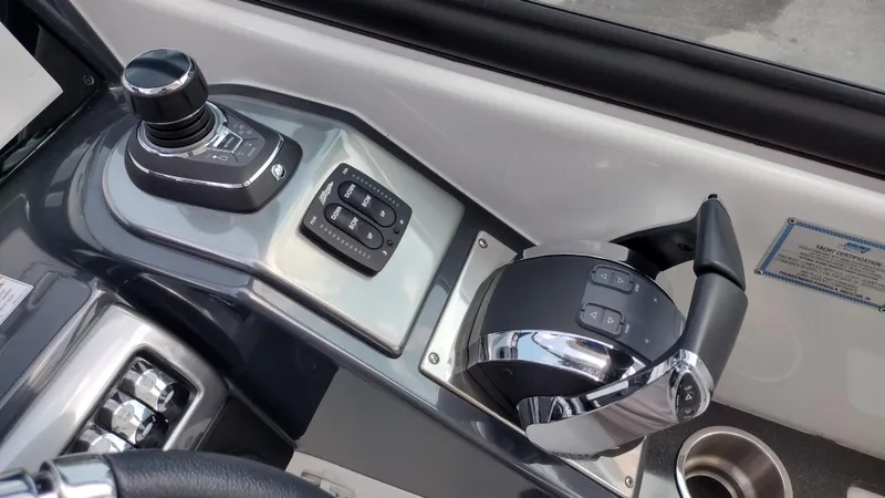 Slide: The Image of Control panel of a 2020 Formula 350 CBR boat with joystick and throttle. - 28