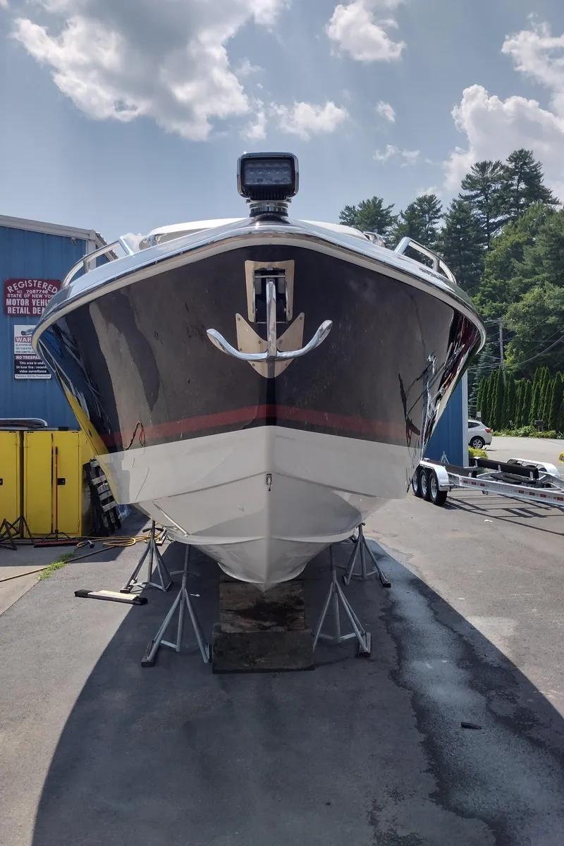 Slide: The Image of 2020 Formula 350 CBR boat on stands, front view, outdoors. - 3