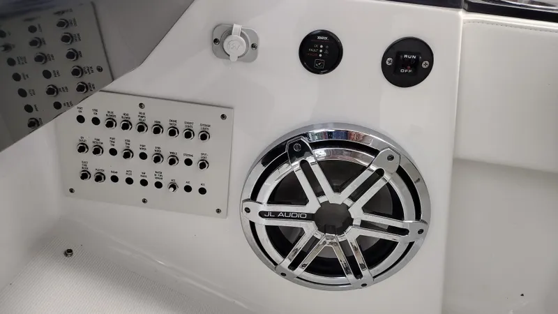 Slide: The Image of Control panel and speaker system on a 2020 Formula 350 CBR boat. - 30