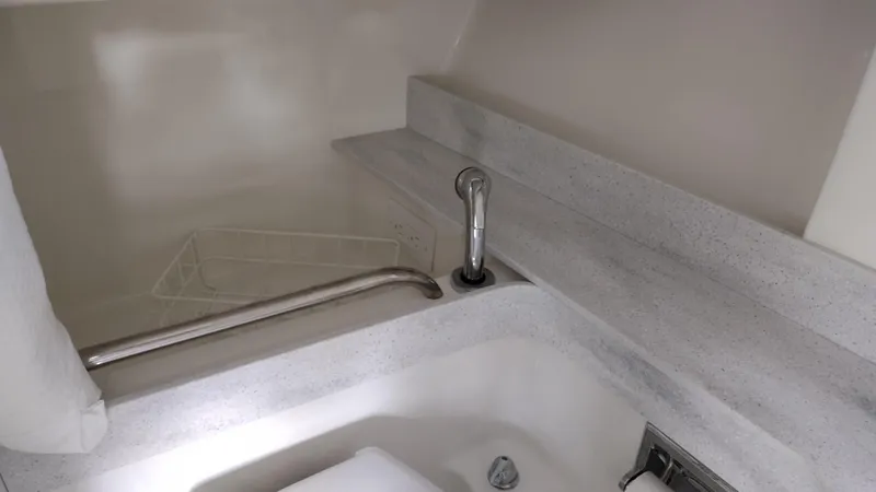 Slide: The Image of 2020 Formula 350 CBR boat interior with sleek countertop and modern faucet. - 32