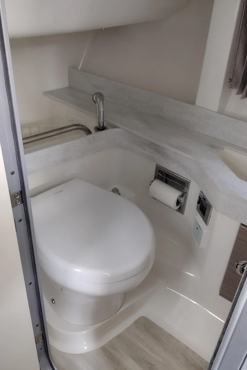 Slide: The Image of 2020 Formula 350 CBR boat bathroom with modern fixtures and compact design. - 34