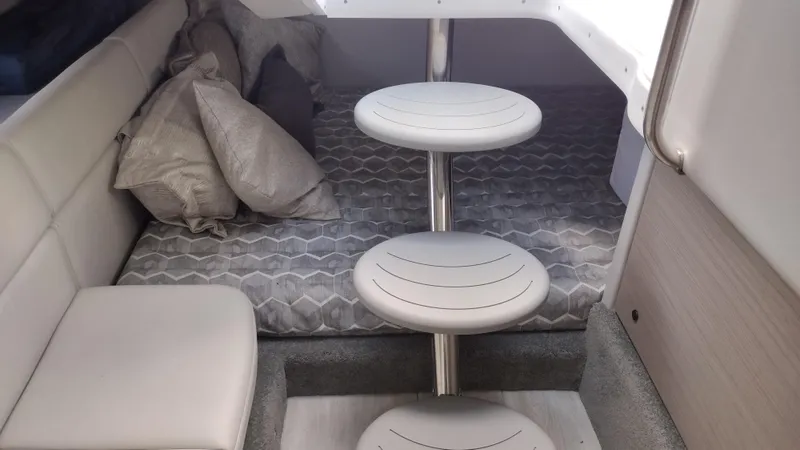 Slide: The Image of 2020 Formula 350 CBR cabin interior with modern seating and bedding. - 38