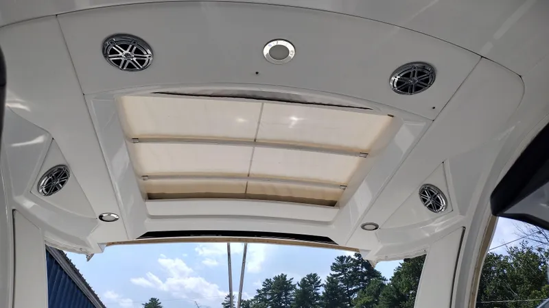Slide: The Image of 2020 Formula 350 CBR boat interior ceiling with speakers and skylight. - 46