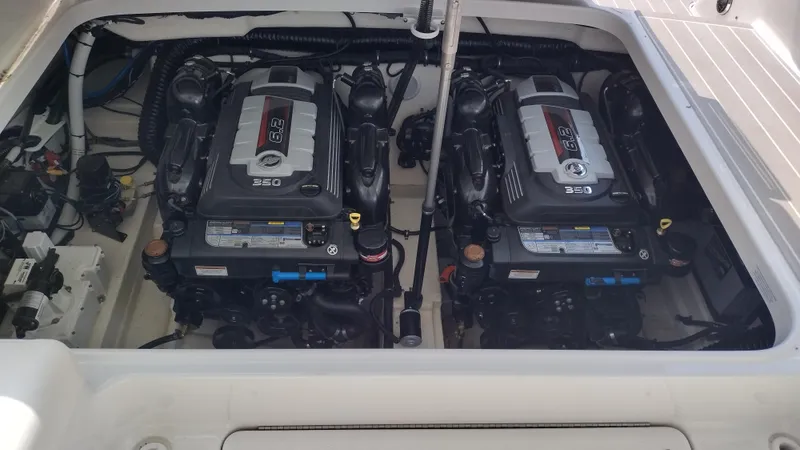 Slide: The Image of Twin engines in a 2020 Formula 350 CBR boat engine compartment. - 48
