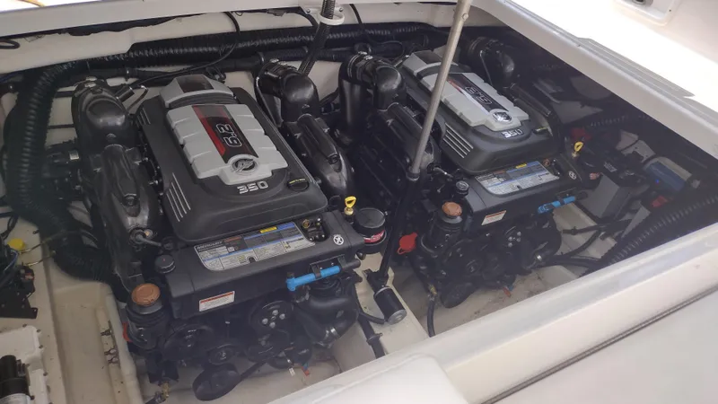 Slide: The Image of Twin engines in a 2020 Formula 350 CBR boat engine compartment. - 49