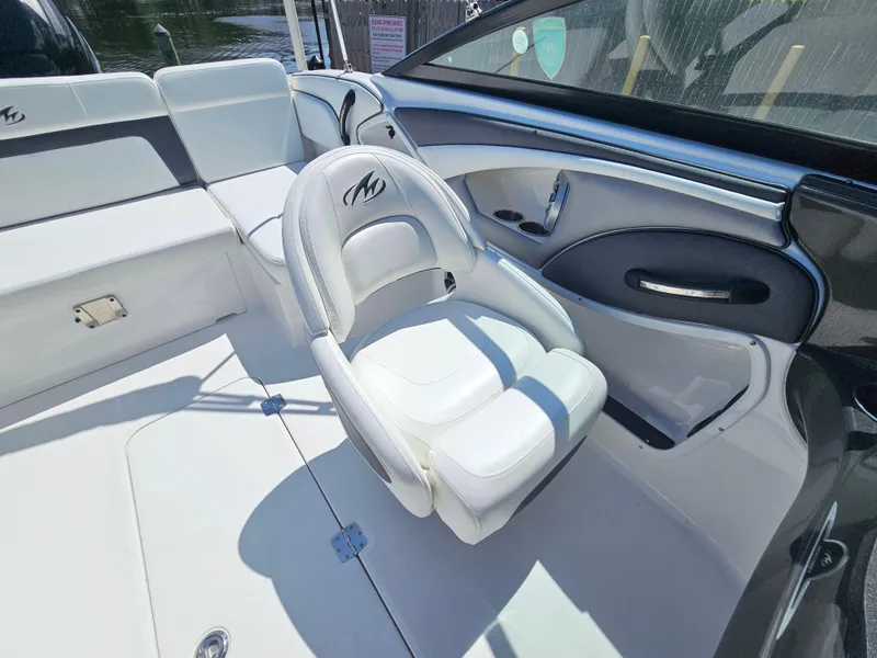 Slide: The Image of 2017 Monterey 217 Outboard boat interior with white seating and sleek design. - 18