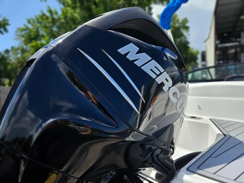 Slide: The Image of Close-up of a 2017 Monterey 217 Outboard with Mercury engine, outdoors. - 7