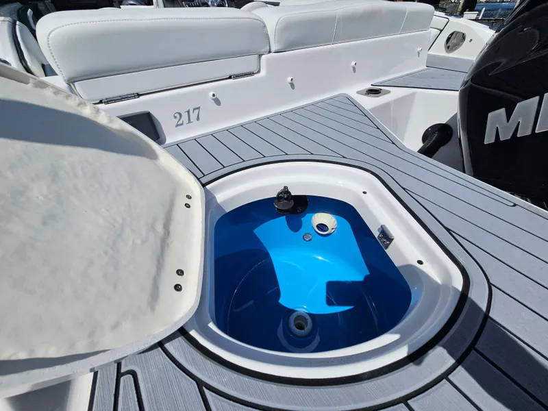 Slide: The Image of 2017 Monterey 217 Outboard boat with open livewell on deck. - 9