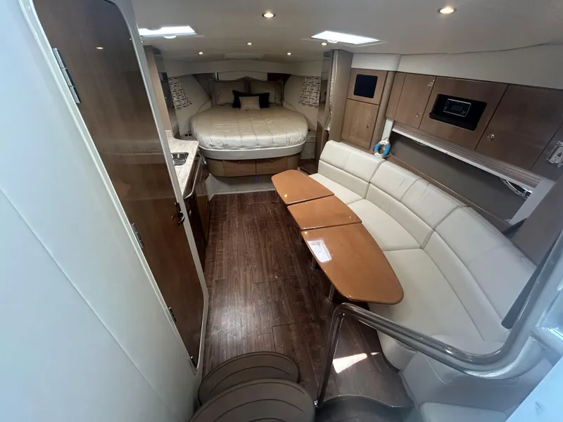 Slide: The Image of Interior of 2021 Formula 34 Performance Cruiser with modern furnishings and cozy seating area. - 11