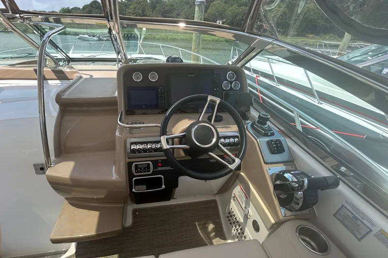 Slide: The Image of Cockpit of 2021 Formula 34 Performance Cruiser with modern controls and steering wheel. - 8