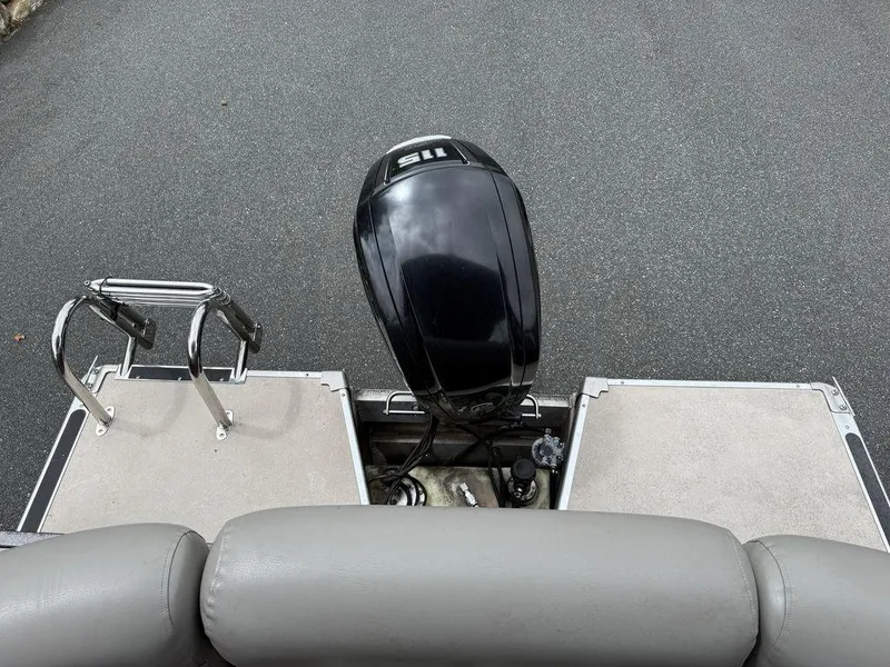 Slide: The Image of 2015 Premier 250 Solaris boat with outboard motor and swim ladder. - 18