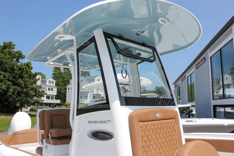 Slide: The Image of 2026 Sea Hunt Ultra 265 SE boat with sleek design and luxurious seating. - 7