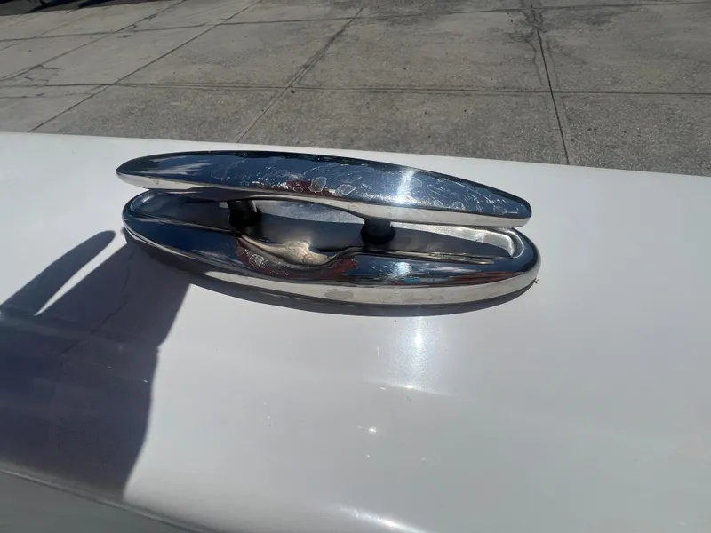 Slide: The Image of Chrome boat cleat on Key Largo 1801 CC, 2021 model. - 16