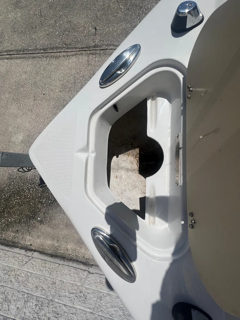 Slide: The Image of Key Largo 1801 CC 2021 boat bow with open storage compartment. - 21