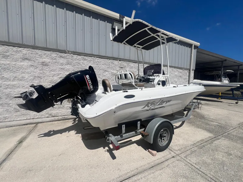 Slide: The Image of 2021 Key Largo 1801 CC boat with Suzuki outboard motor on trailer. - 3