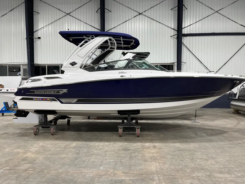 The Image of 2023 Monterey 298 Super Sport boat in a showroom, side view. - 0