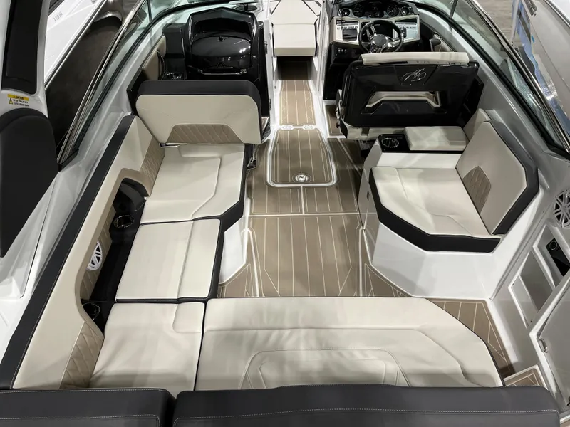 Slide: The Image of 2023 Monterey 298 Super Sport boat interior with luxurious seating and modern design. - 5