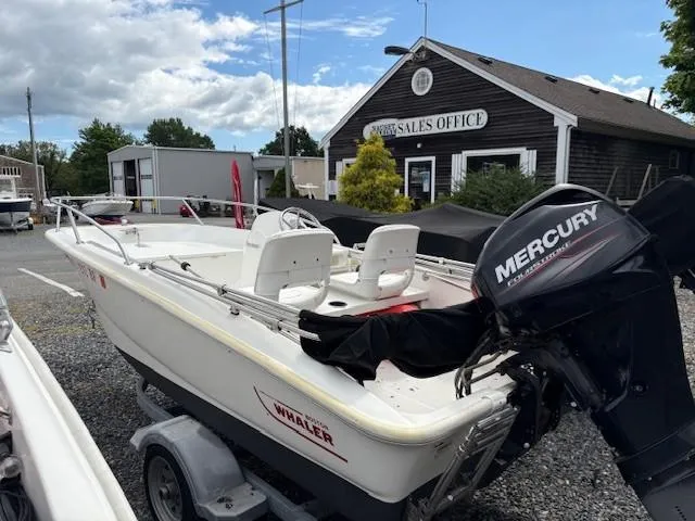 Slide: The Image of 2016 Boston Whaler 130 SS boat with Mercury engine at sales office. - 6
