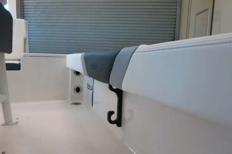 Slide: The Image of 2025 Robalo 226 Cayman boat interior with sleek seating and modern design. - 22