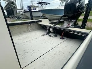 Slide: The Image of 1976 Boston Whaler 21 Outrage boat interior with Suzuki outboard motor. - 9