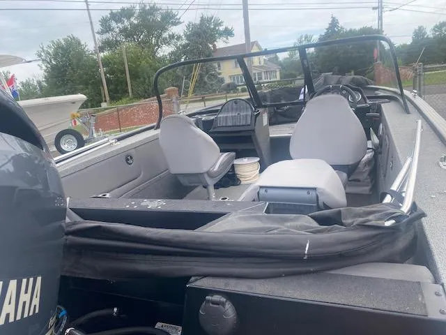 Slide: The Image of 2019 Starweld Fusion Pro 18 DC boat with Yamaha engine, featuring spacious seating. - 10