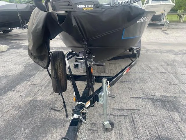 Slide: The Image of 2019 Starweld Fusion Pro 18 DC boat on trailer with Minn Kota motor. - 2