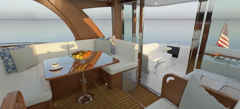 Slide: The Image of Luxurious interior of 2026 Sabre 51 Salon Express yacht with elegant seating and scenic water view. - 8