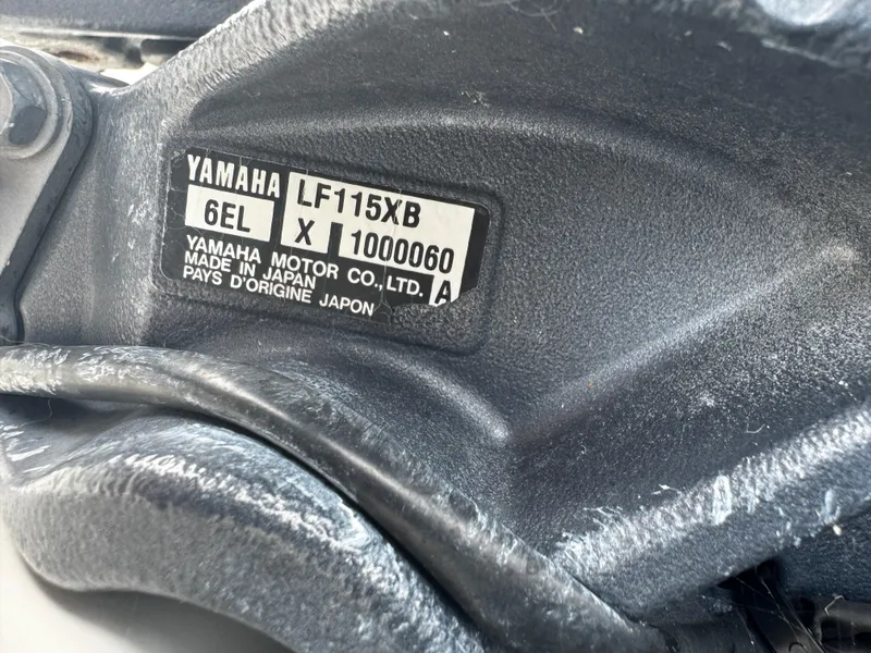 Slide: The Image of Yamaha LF115XB engine label on 2015 Cobia 237 Center Console boat. - 37