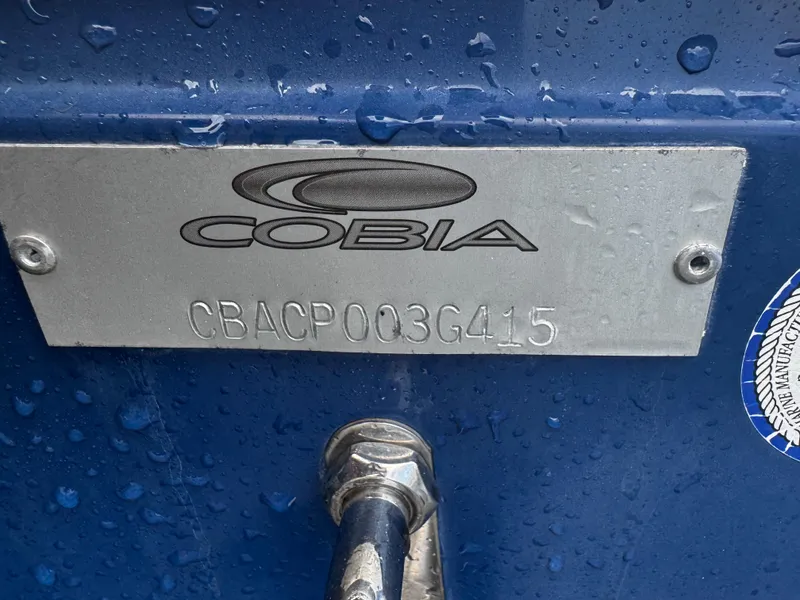 Slide: The Image of 2015 Cobia 237 Center Console boat identification plate with serial number. - 38