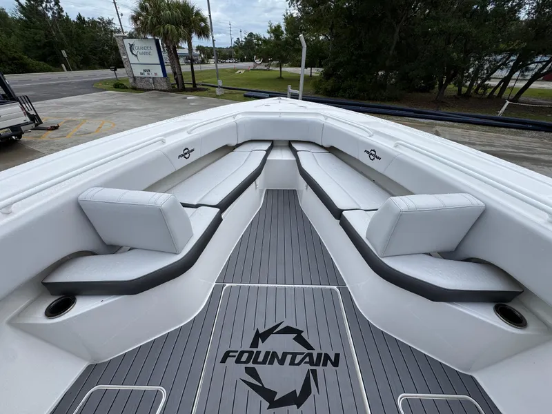 Slide: The Image of 2022 Fountain 38 CC boat interior with sleek seating and modern design. - 19