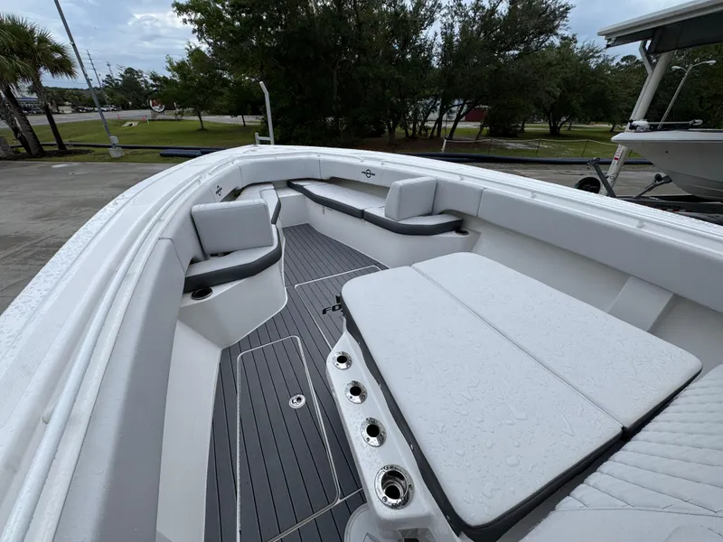 Slide: The Image of 2022 Fountain 38 CC boat interior with sleek seating and modern design. - 20