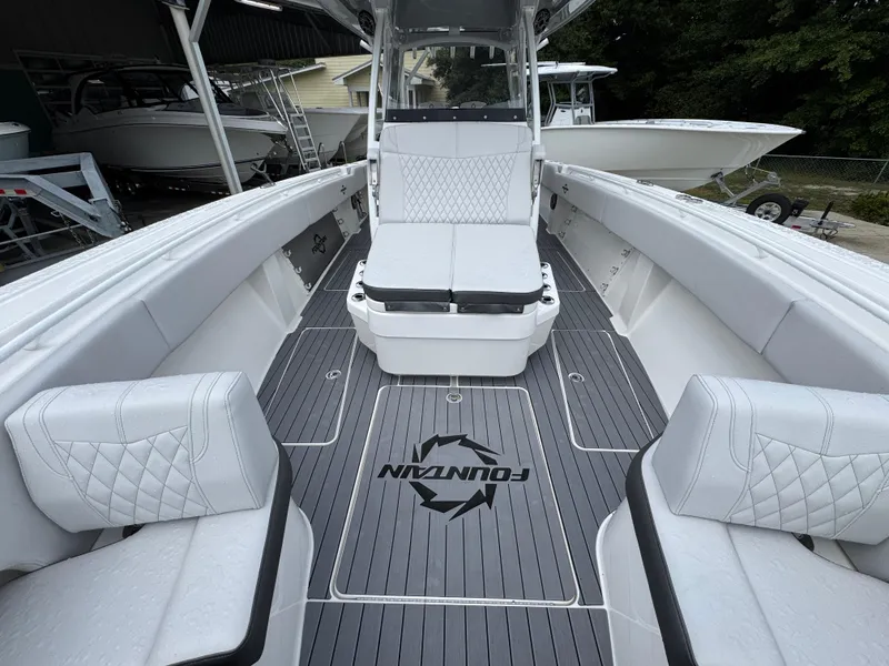 Slide: The Image of 2022 Fountain 38 CC boat interior with sleek seating and modern design. - 23