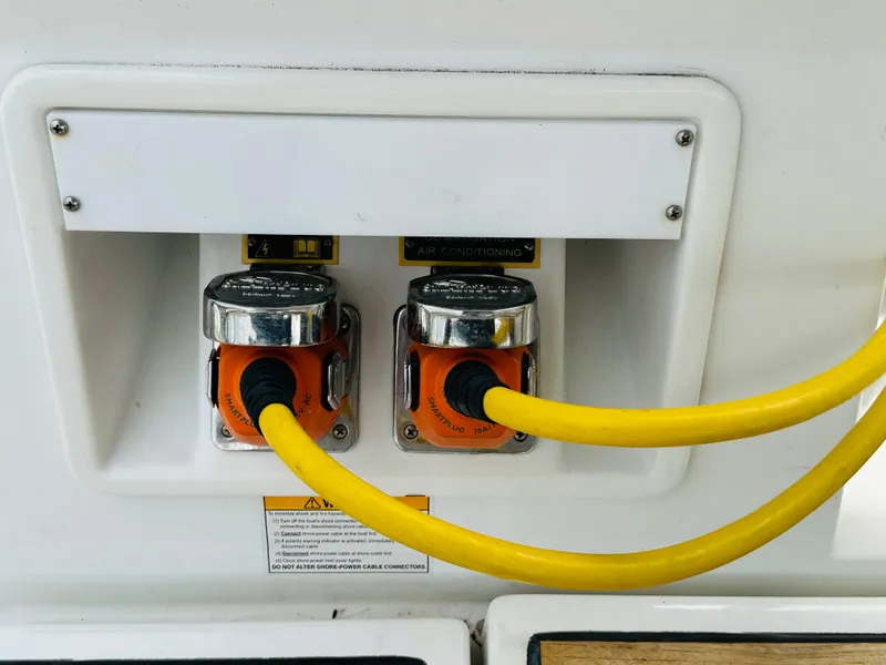 Slide: The Image of Power connections on a 2015 Beneteau Oceanis 45 yacht with yellow cables. - 30
