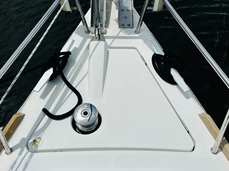 Slide: The Image of Bow of 2015 Beneteau Oceanis 45 sailboat with winch and ropes. - 39